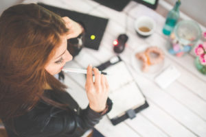 girl planning her goal setting strategy.